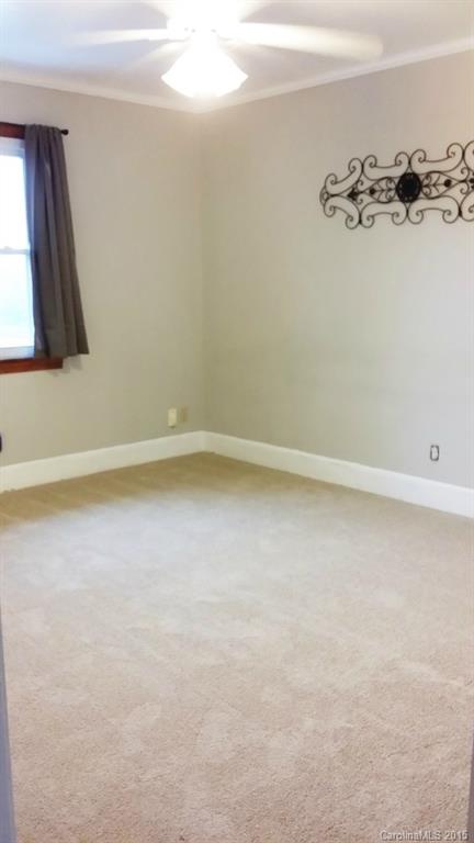10060 Unity Church Road Mooresville, NC 28115 - Photo 12 of 22 an empty room with a window