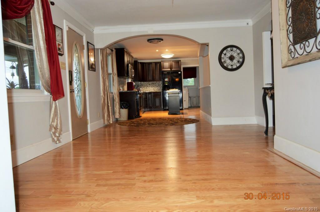 10060 Unity Church Road Mooresville, NC 28115 - Photo 3 of 22 a view of a living room and kitchen view