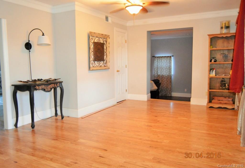 10060 Unity Church Road Mooresville, NC 28115 - Photo 4 of 22 a view of empty room with wooden floor