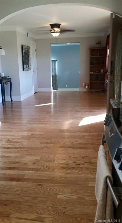 10060 Unity Church Road Mooresville, NC 28115 - Photo 10 of 22 a view of empty room with wooden floor