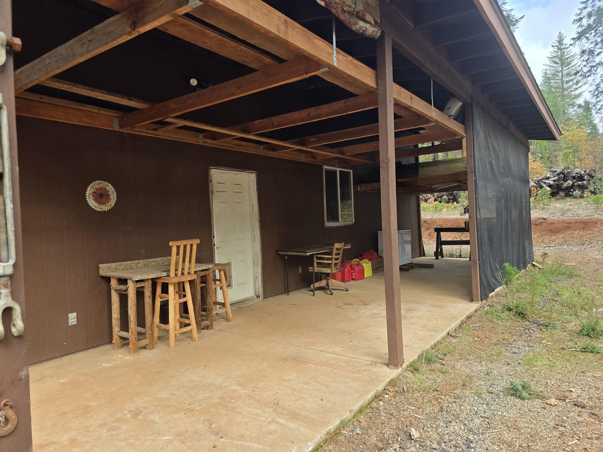29104 Johnson Road Montgomery Creek, CA 96065 - Photo 102 of 137 a view of a outdoor space with porch and furniture