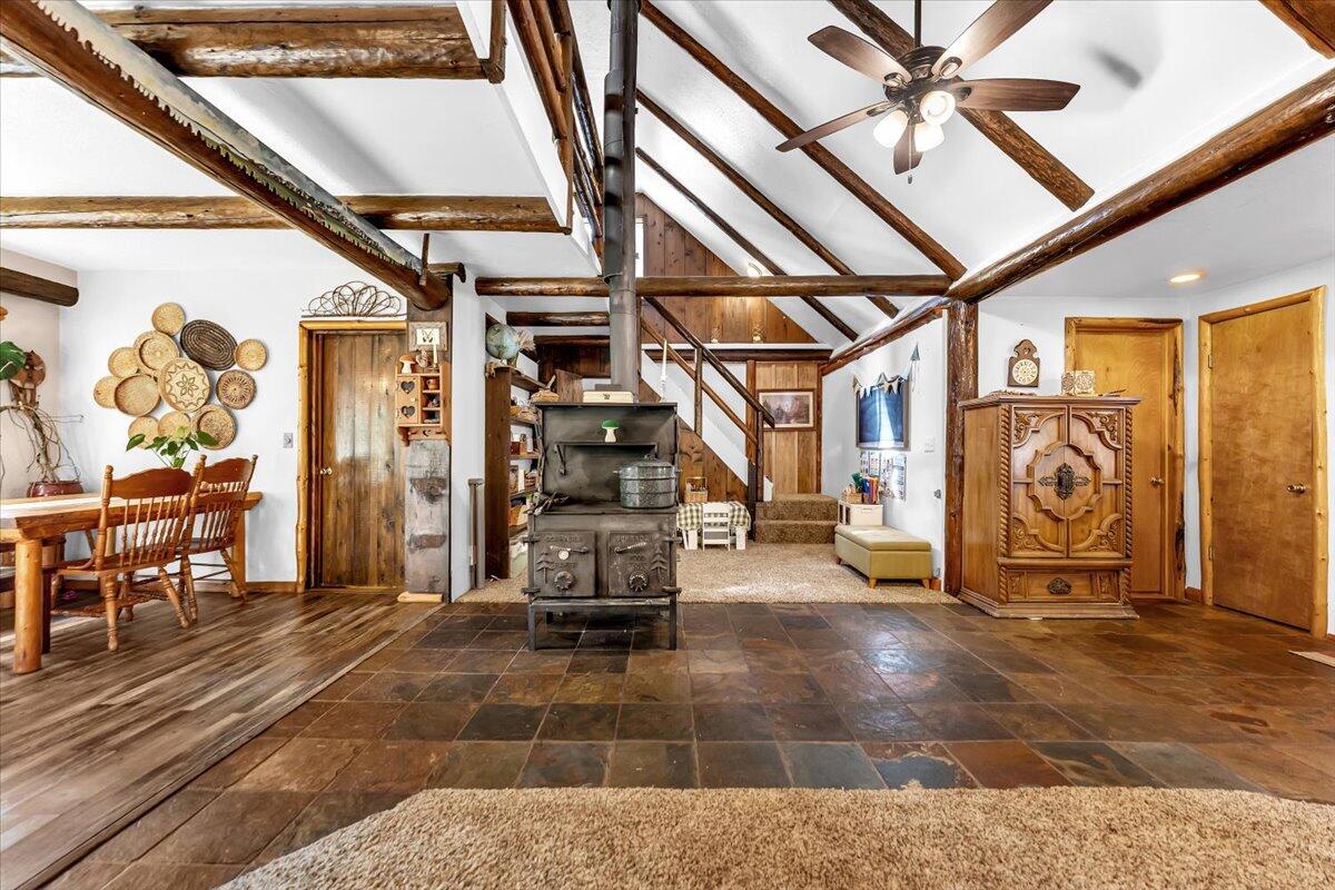 29104 Johnson Road Montgomery Creek, CA 96065 - Photo 31 of 137 a view of a garage with table and chairs