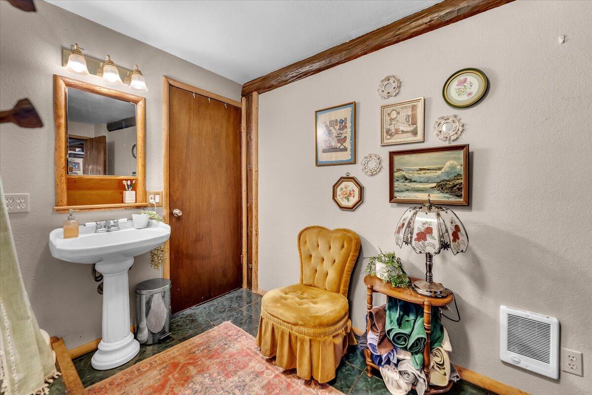 29104 Johnson Road Montgomery Creek, CA 96065 - Photo 53 of 137 a bathroom with a sink and a mirror