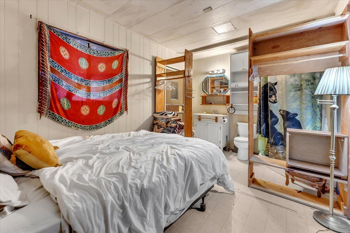29104 Johnson Road Montgomery Creek, CA 96065 - Photo 64 of 137 a bedroom with a bed and window