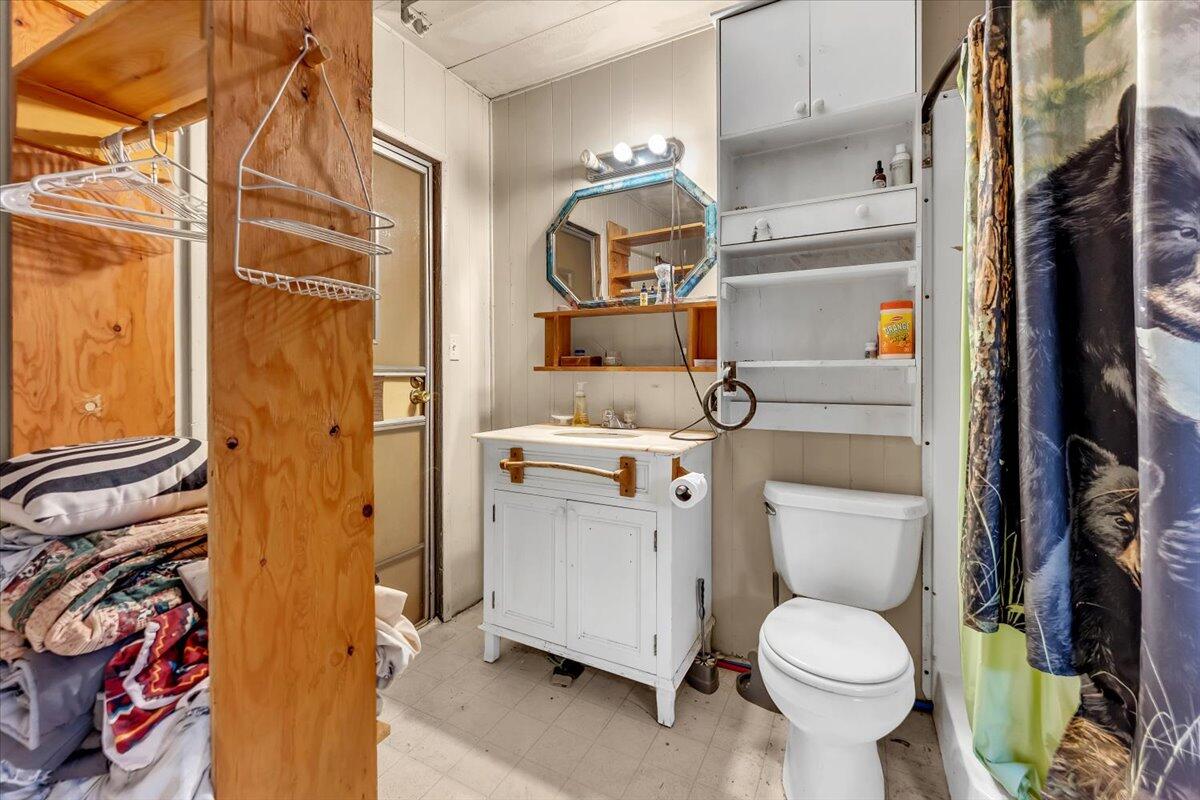 29104 Johnson Road Montgomery Creek, CA 96065 - Photo 65 of 137 a white toilet sitting next to a bathroom