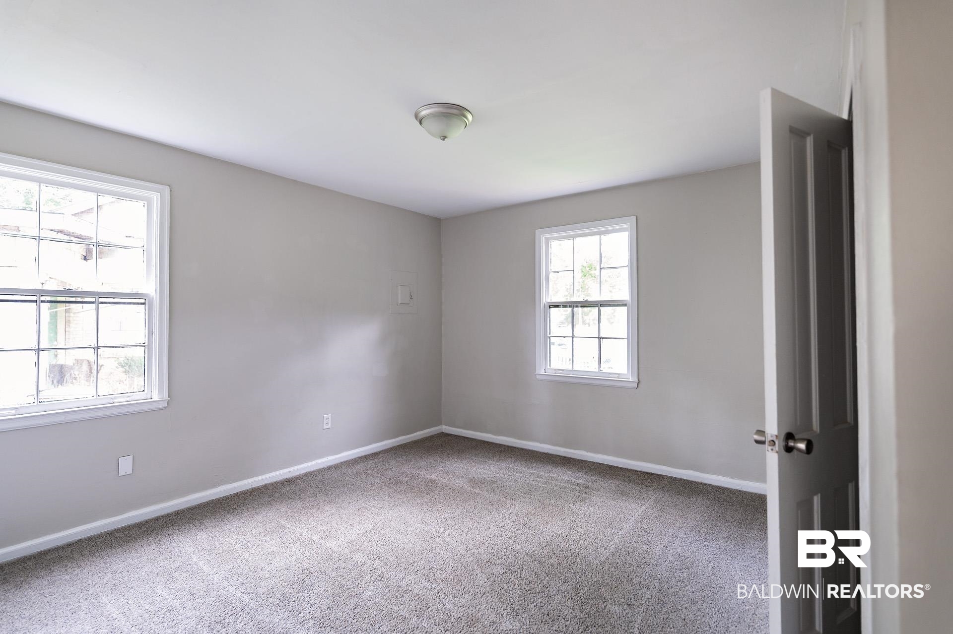 1869 Mott Drive West Mobile, AL 36617 - Photo 15 of 34 Carpeted spare room with baseboards