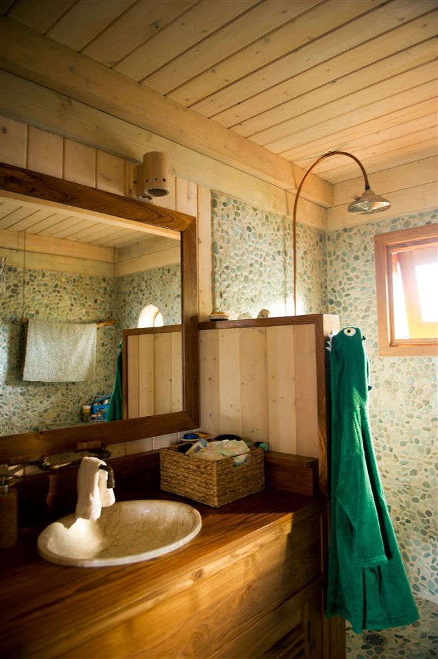 56 West Waipio Road Haiku, HI 96708 - Photo 17 of 25 a bathroom with a sink and a mirror