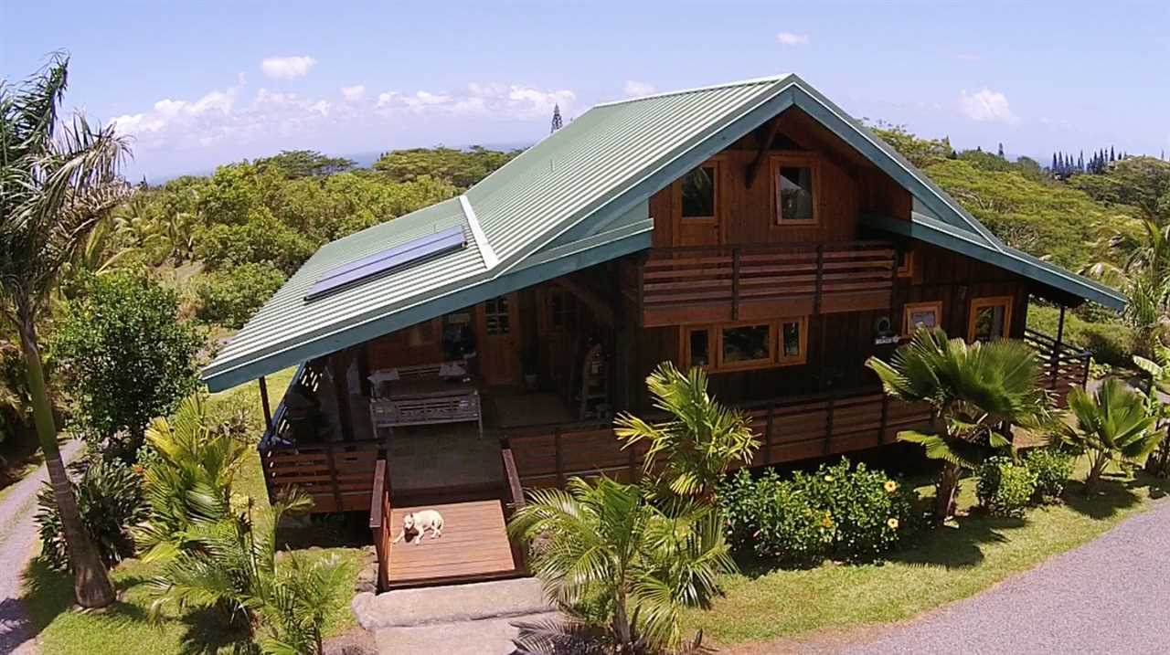56 West Waipio Road Haiku, HI 96708 - Photo 23 of 25 a front view of a house with a yard