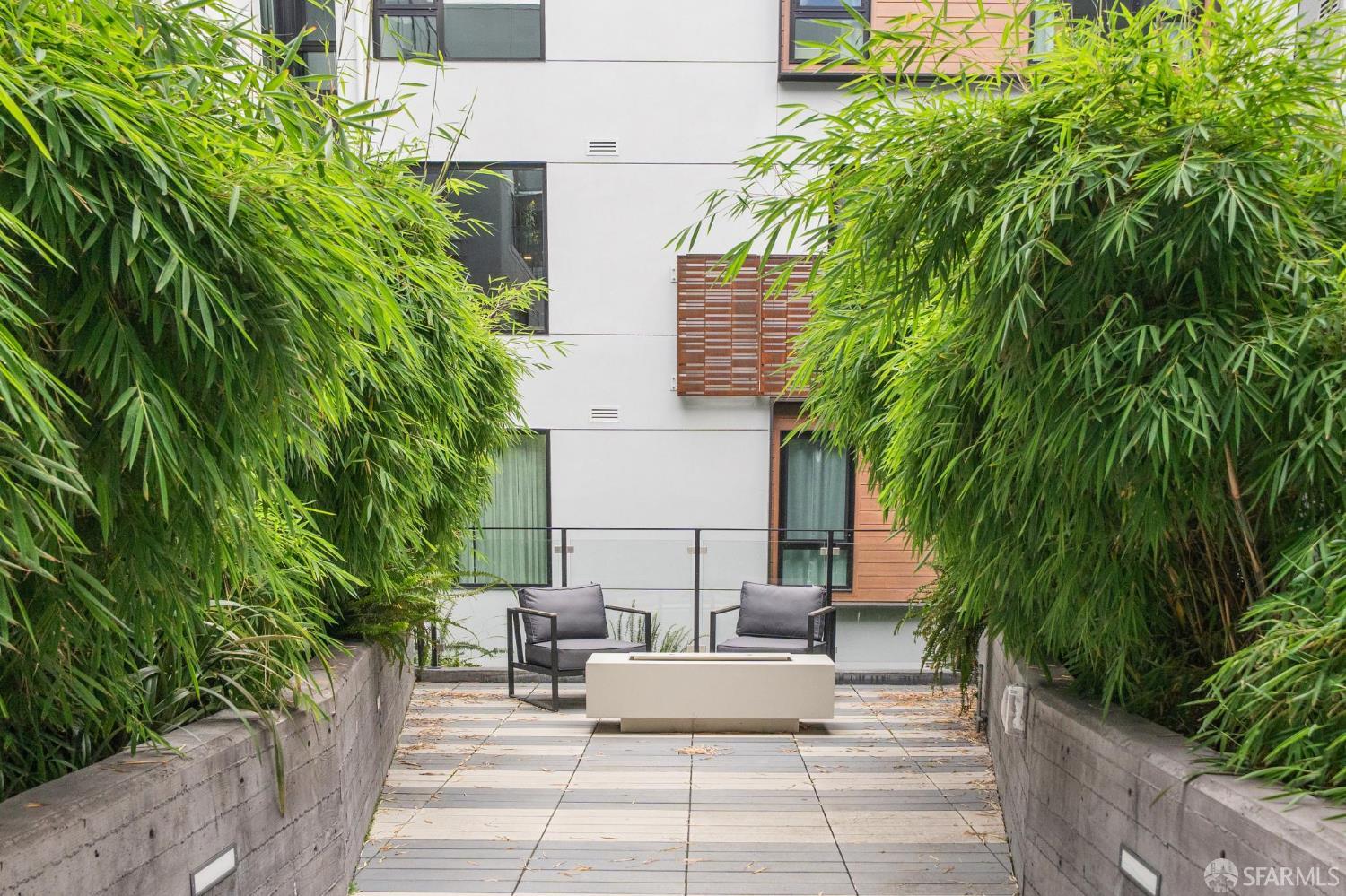 1288 Howard Street, Unit 317 San Francisco, CA 94103 - Photo 35 of 57 a view of backyard with outdoor seating and plants
