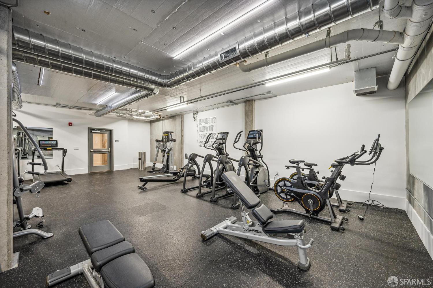 1288 Howard Street, Unit 317 San Francisco, CA 94103 - Photo 45 of 57 a view of a room with gym equipment