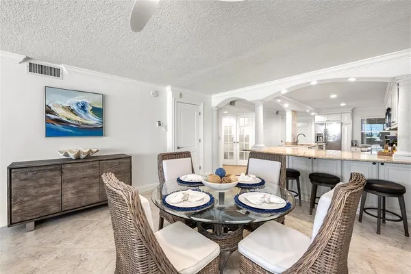 a view of a dining room with furniture