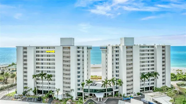 a view of a city with tall buildings