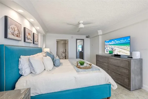 a view of a bathroom with tub and mirror