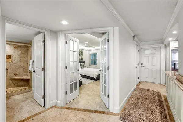 a bedroom with two beds and painted walls