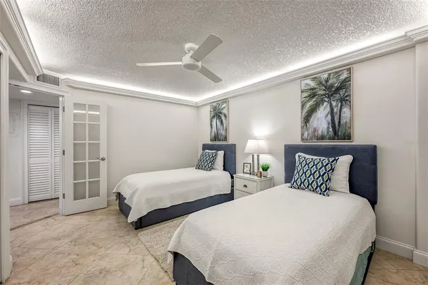 a bathroom with a sink toilet mirror and shower