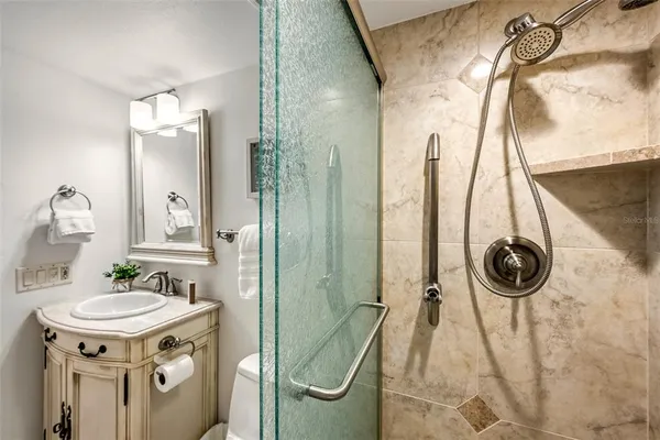 a view of swimming pool with outdoor seating