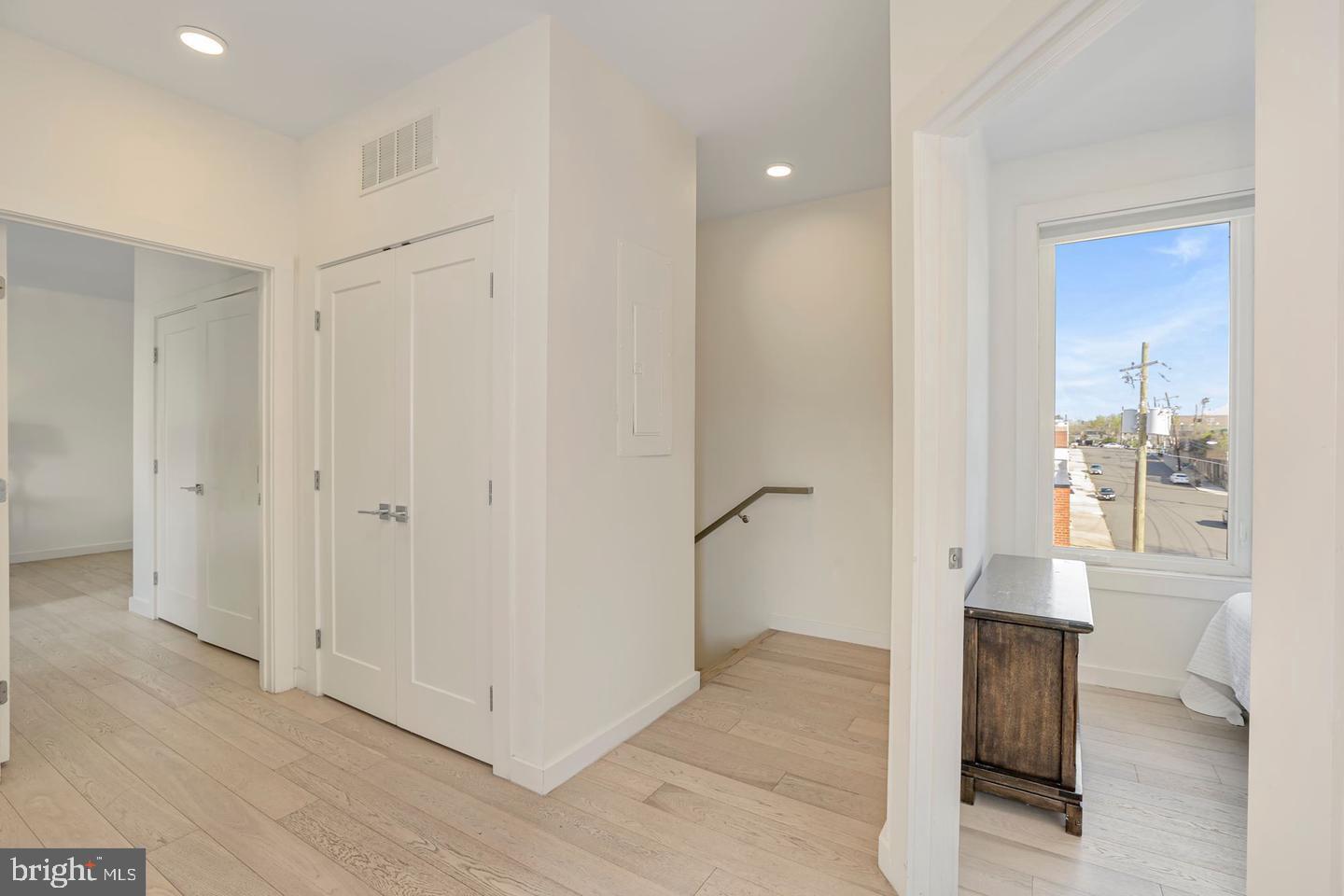 1495 Gallaudet Street Northeast Washington, DC 20002 - Photo 17 of 32 a view of a hallway to an empty room and window