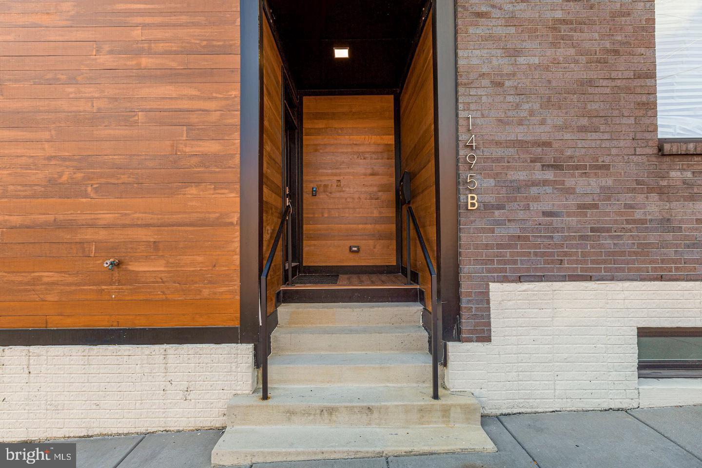 1495 Gallaudet Street Northeast Washington, DC 20002 - Photo 2 of 32 a view of entrance door of the house