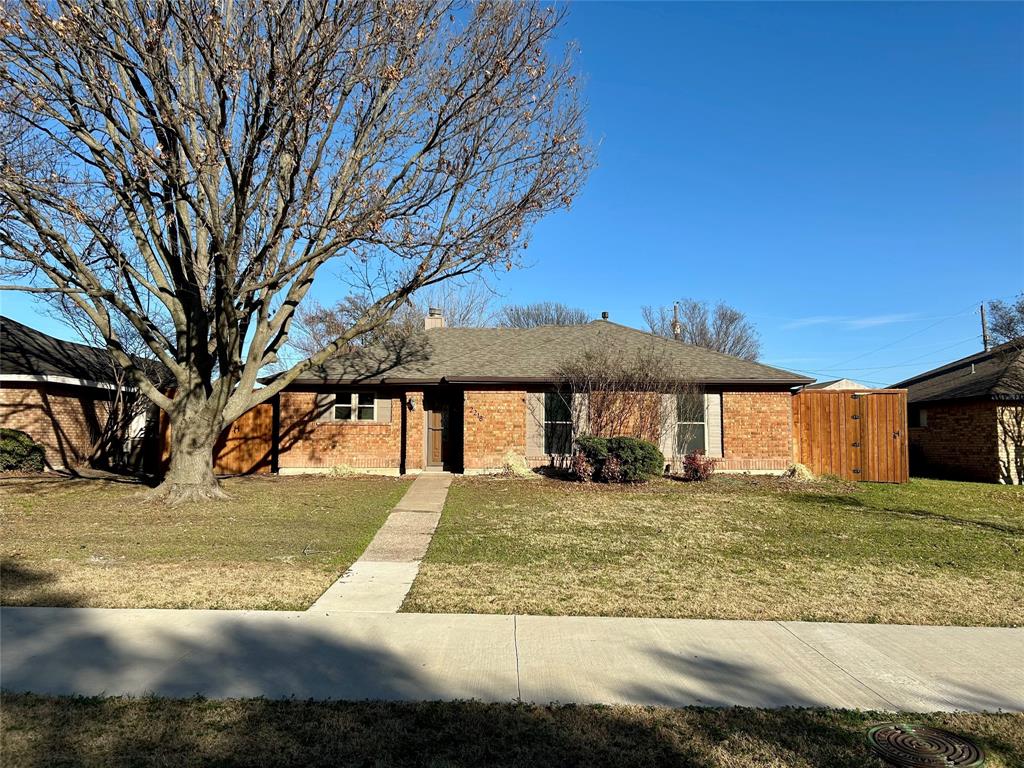 a view of a house with backyard porch and sitting area