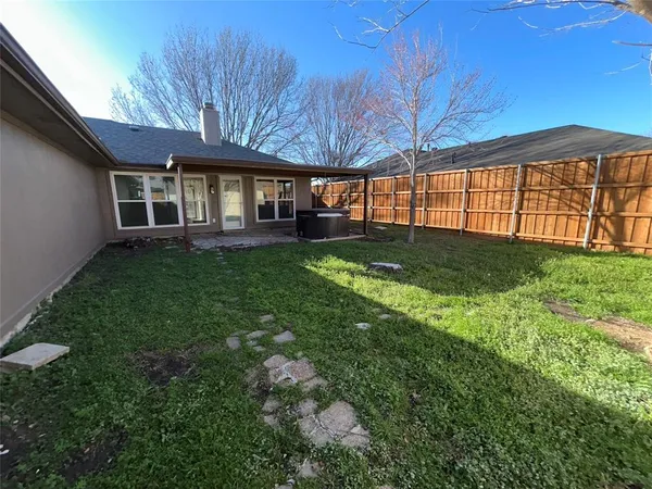 a view of a porch with wooden floor