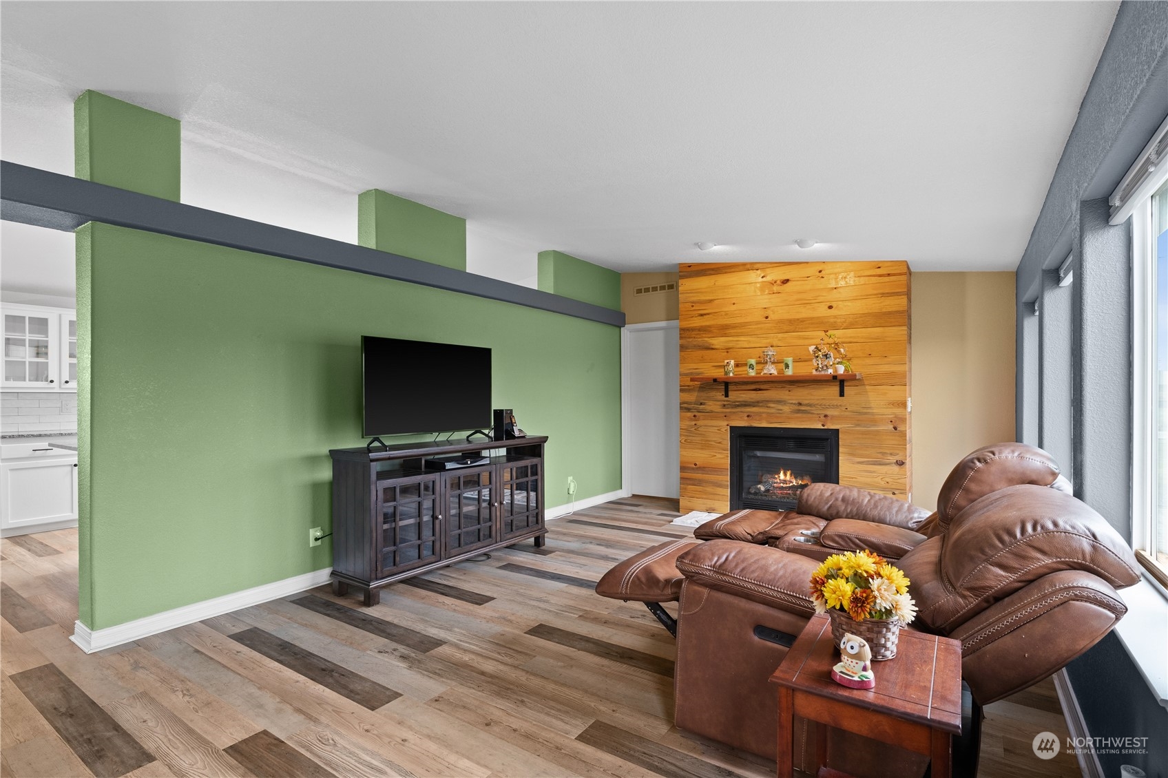 901 West Hendrickson Road Sequim, WA 98382 - Photo 20 of 39 a living room with furniture and a flat screen tv