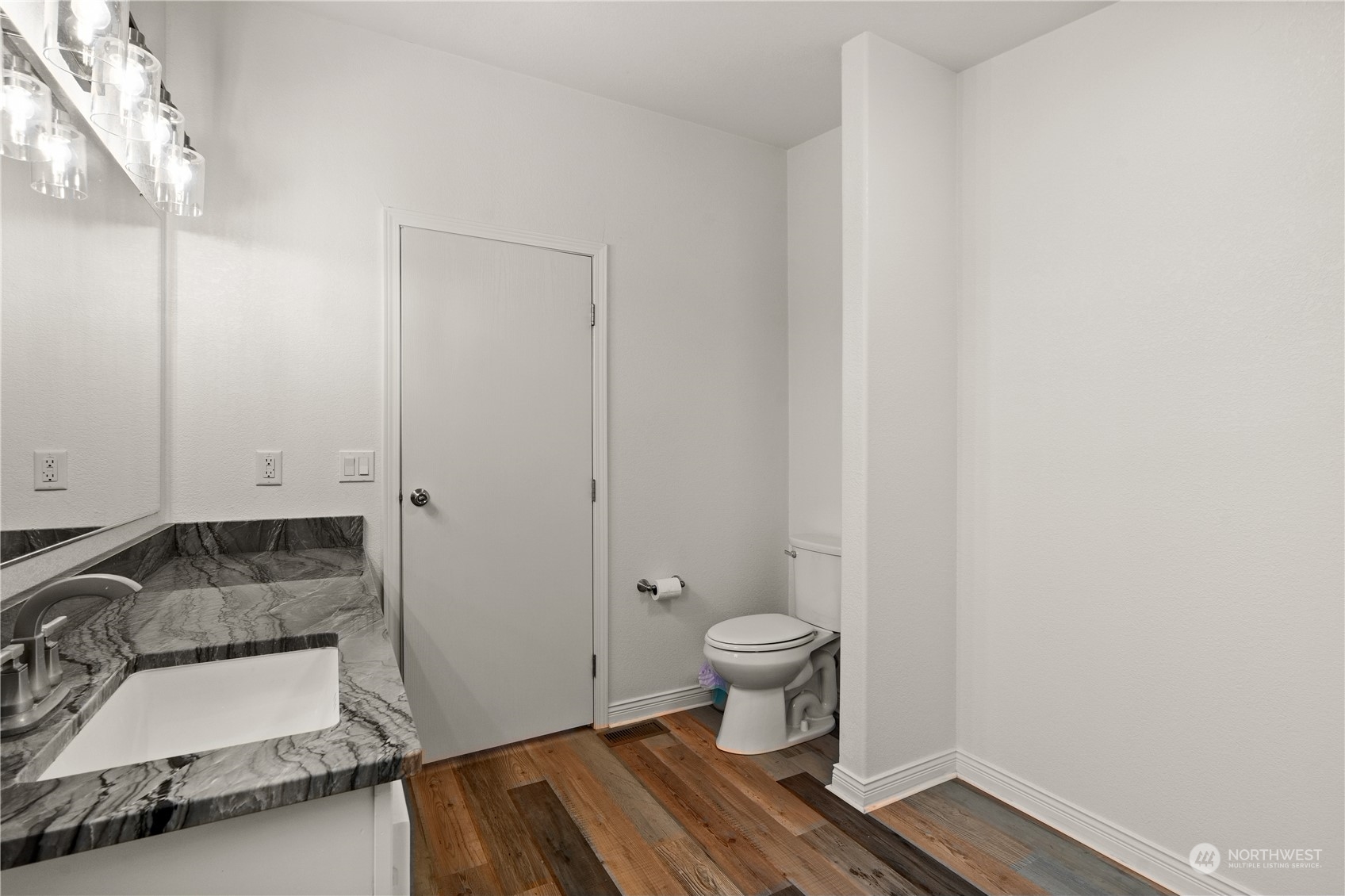 901 West Hendrickson Road Sequim, WA 98382 - Photo 27 of 39 a bathroom with a sink and a toilet