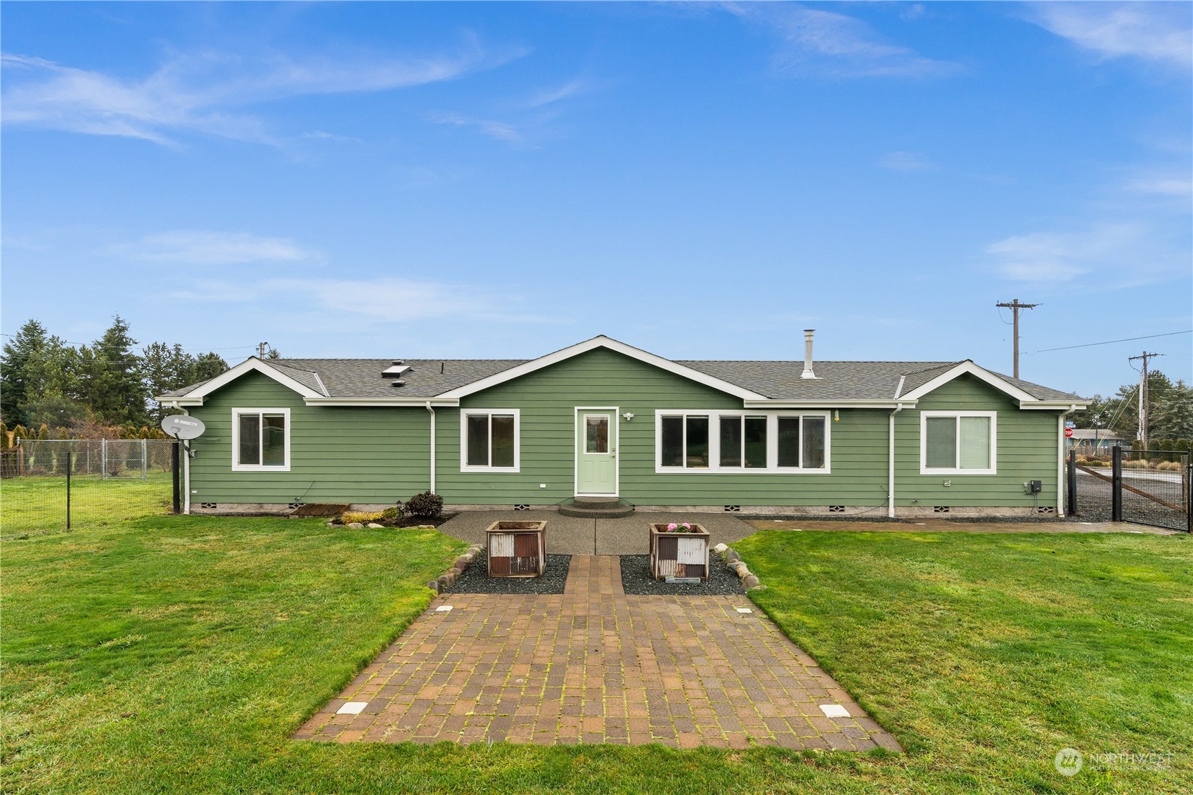 901 West Hendrickson Road Sequim, WA 98382 - Photo 35 of 39 a front view of a house with a yard
