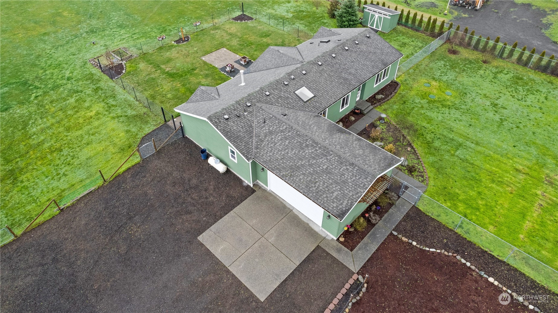 901 West Hendrickson Road Sequim, WA 98382 - Photo 4 of 39 an aerial view of a house with a yard