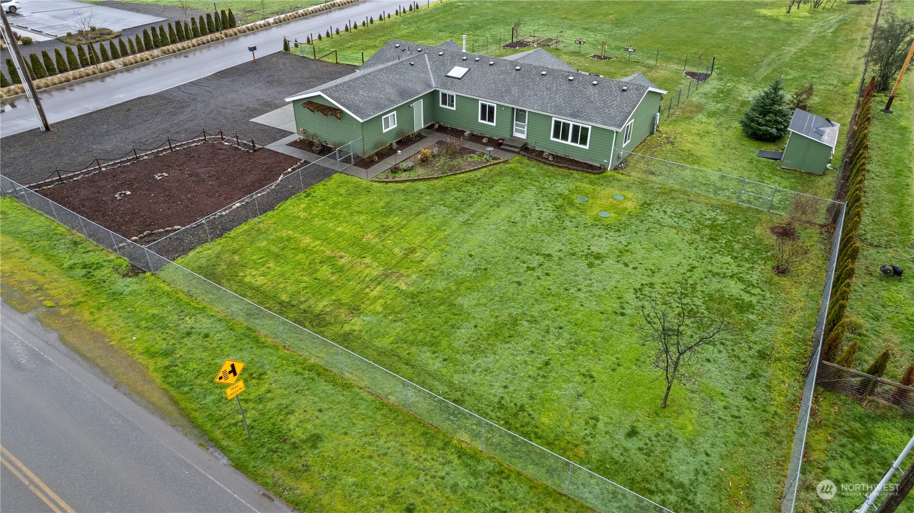 901 West Hendrickson Road Sequim, WA 98382 - Photo 5 of 39 an aerial view of a house