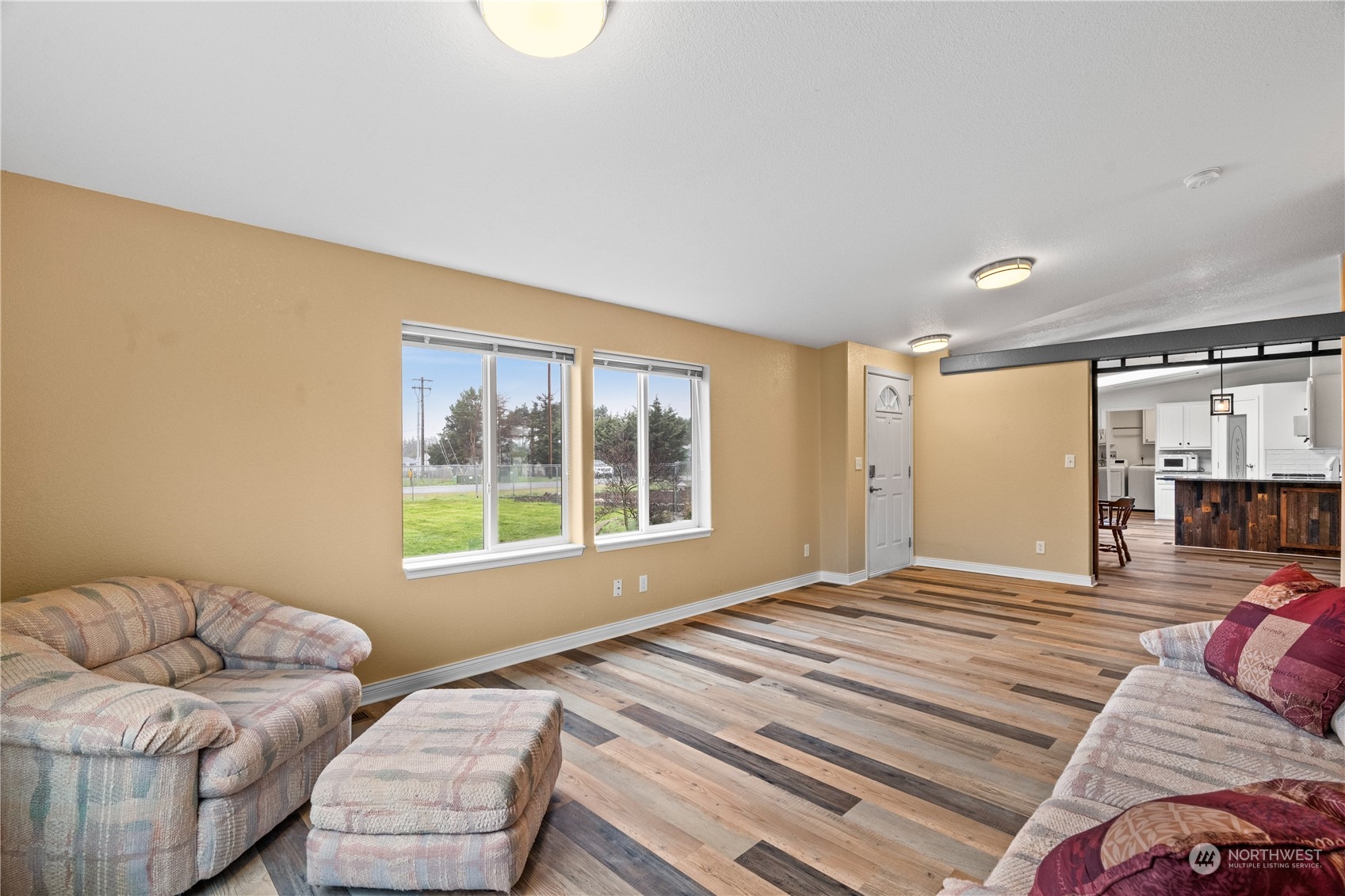 901 West Hendrickson Road Sequim, WA 98382 - Photo 8 of 39 a bedroom with a bed and a window