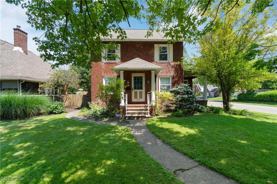 302 Poplar Avenue Northwest Canton, OH 44708 - Photo 1 of 34 American foursquare style home with brick siding