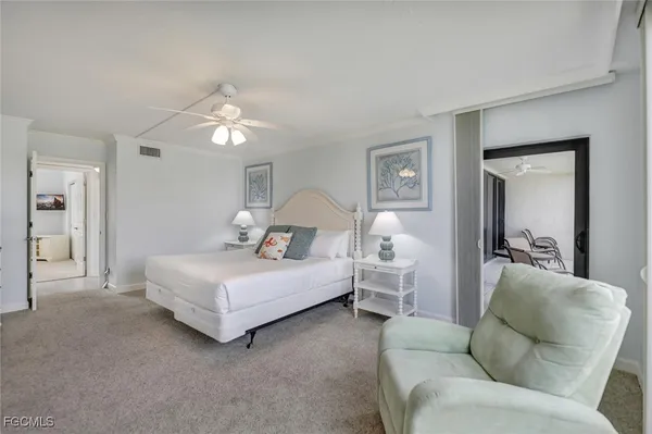 a bedroom with a bed and furniture