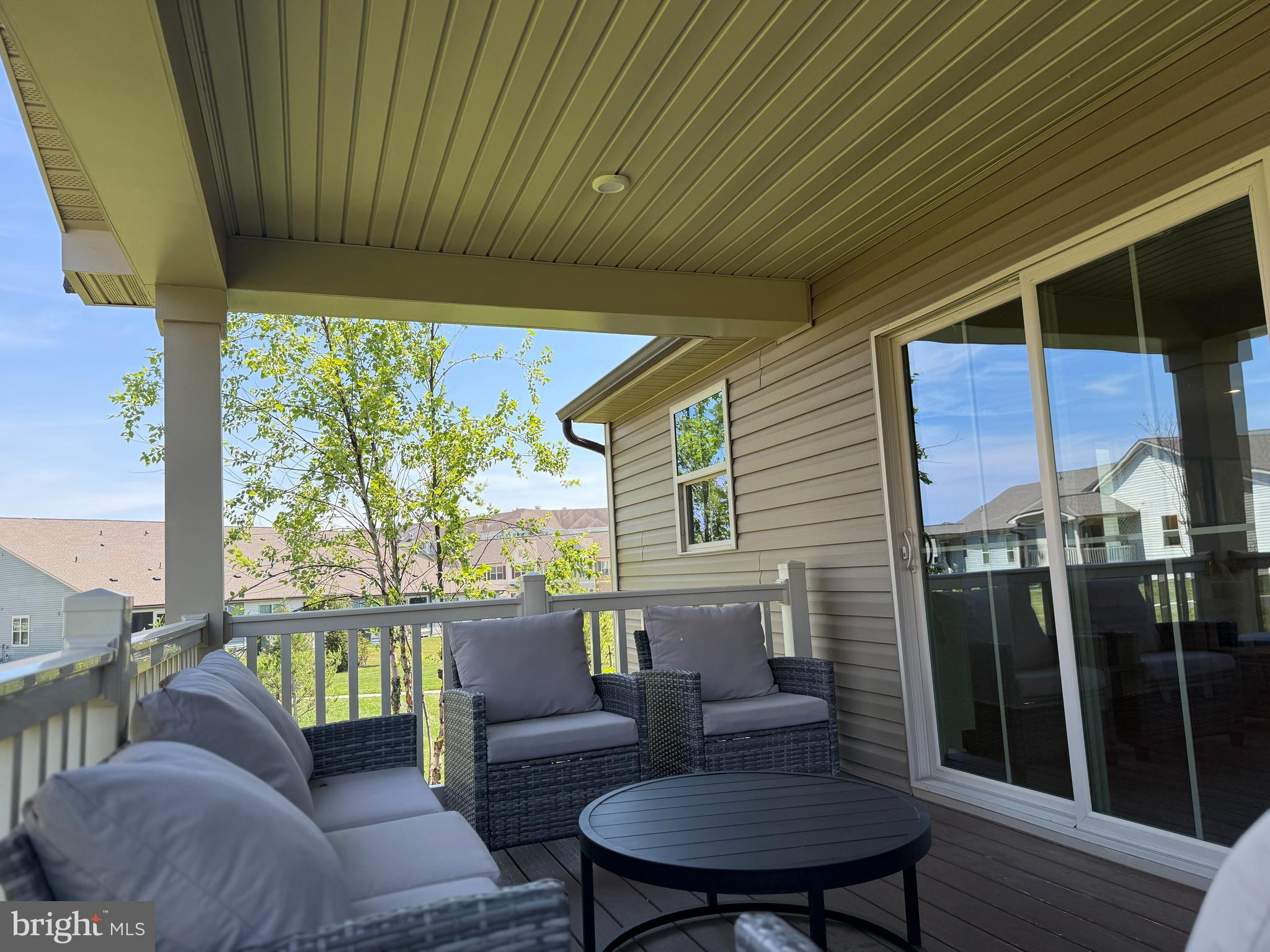 2506 Crown Point Circle Frederick, MD 21702 - Photo 5 of 21 a balcony with furniture and a potted plant