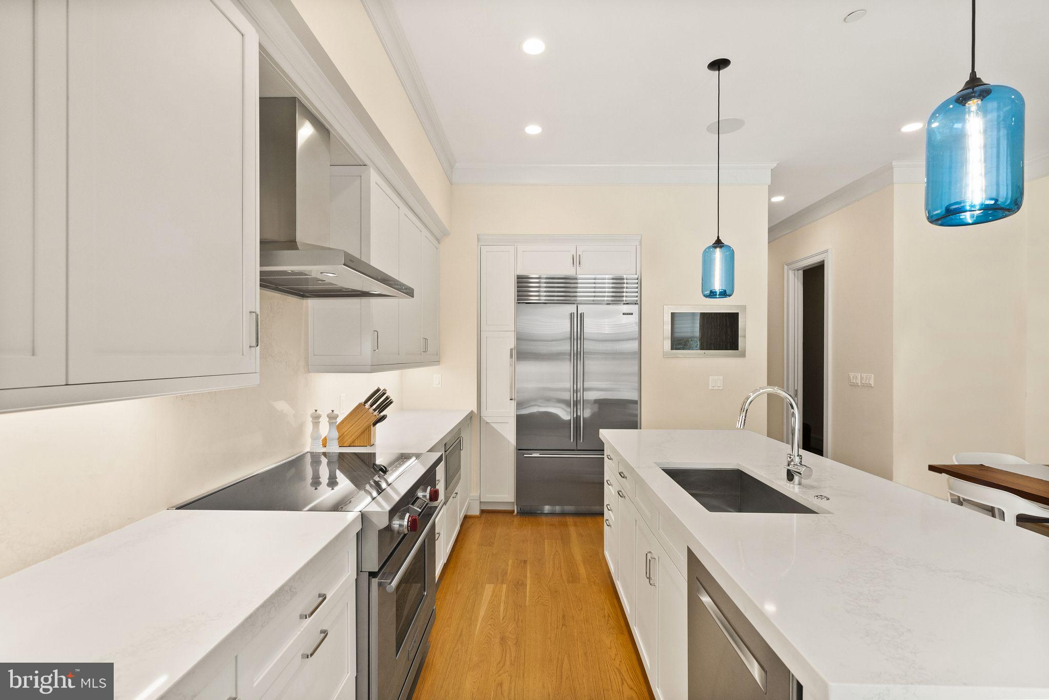 424 3rd Street Northeast Washington, DC 20002 - Photo 12 of 33 a kitchen that has a sink a stove and a refrigerator