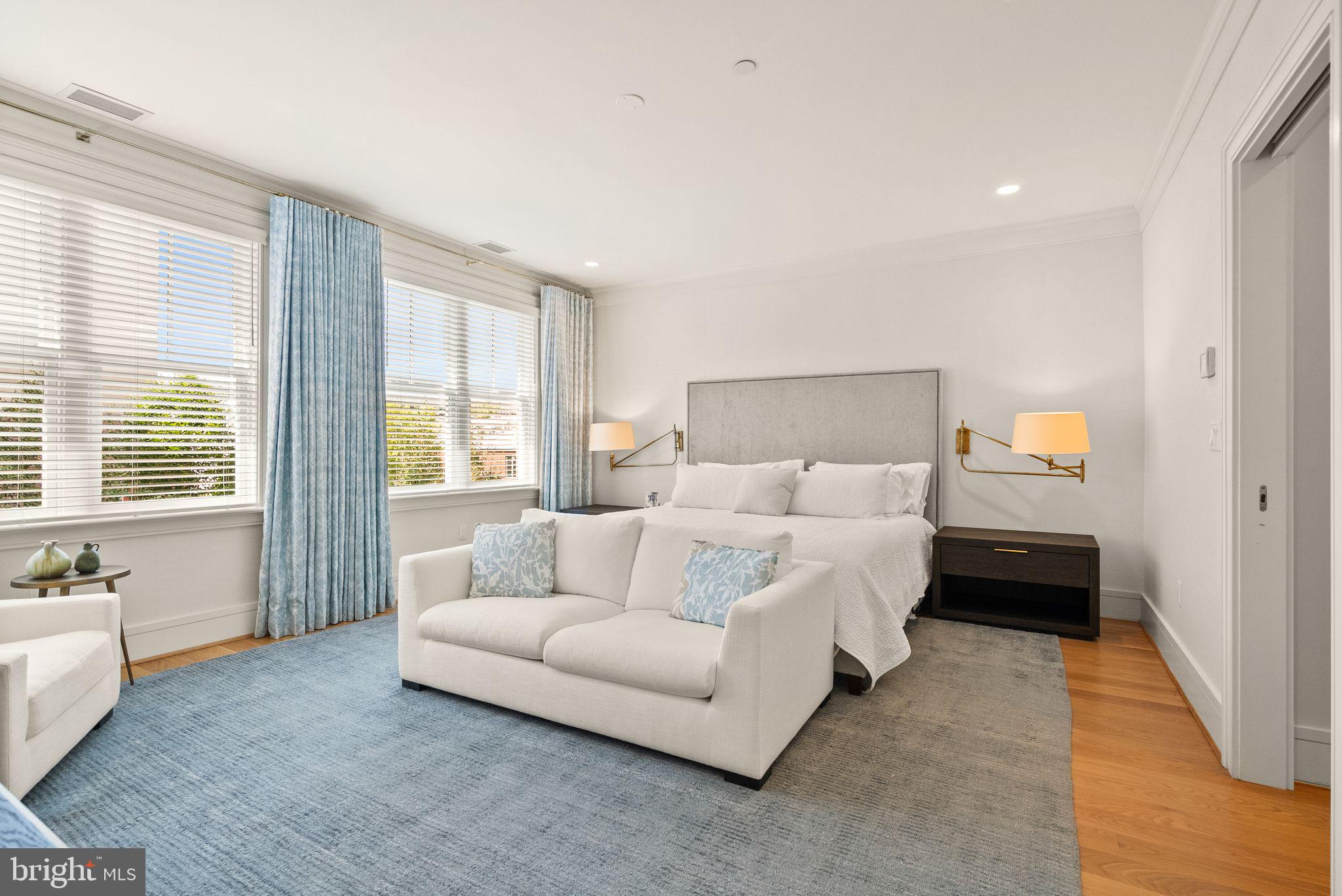 424 3rd Street Northeast Washington, DC 20002 - Photo 17 of 33 a bed room with a bed and a couch