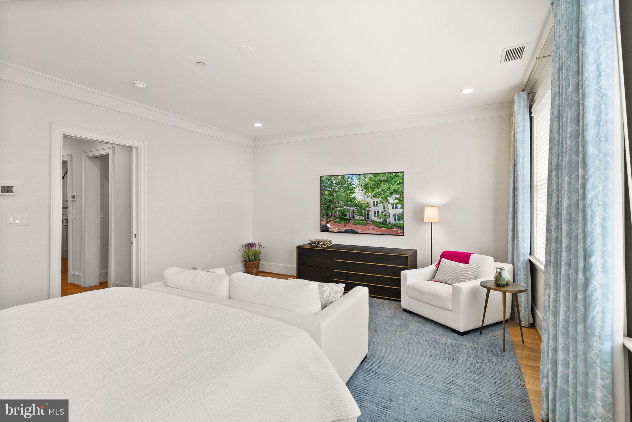 424 3rd Street Northeast Washington, DC 20002 - Photo 18 of 33 a bedroom with a bed and a couch