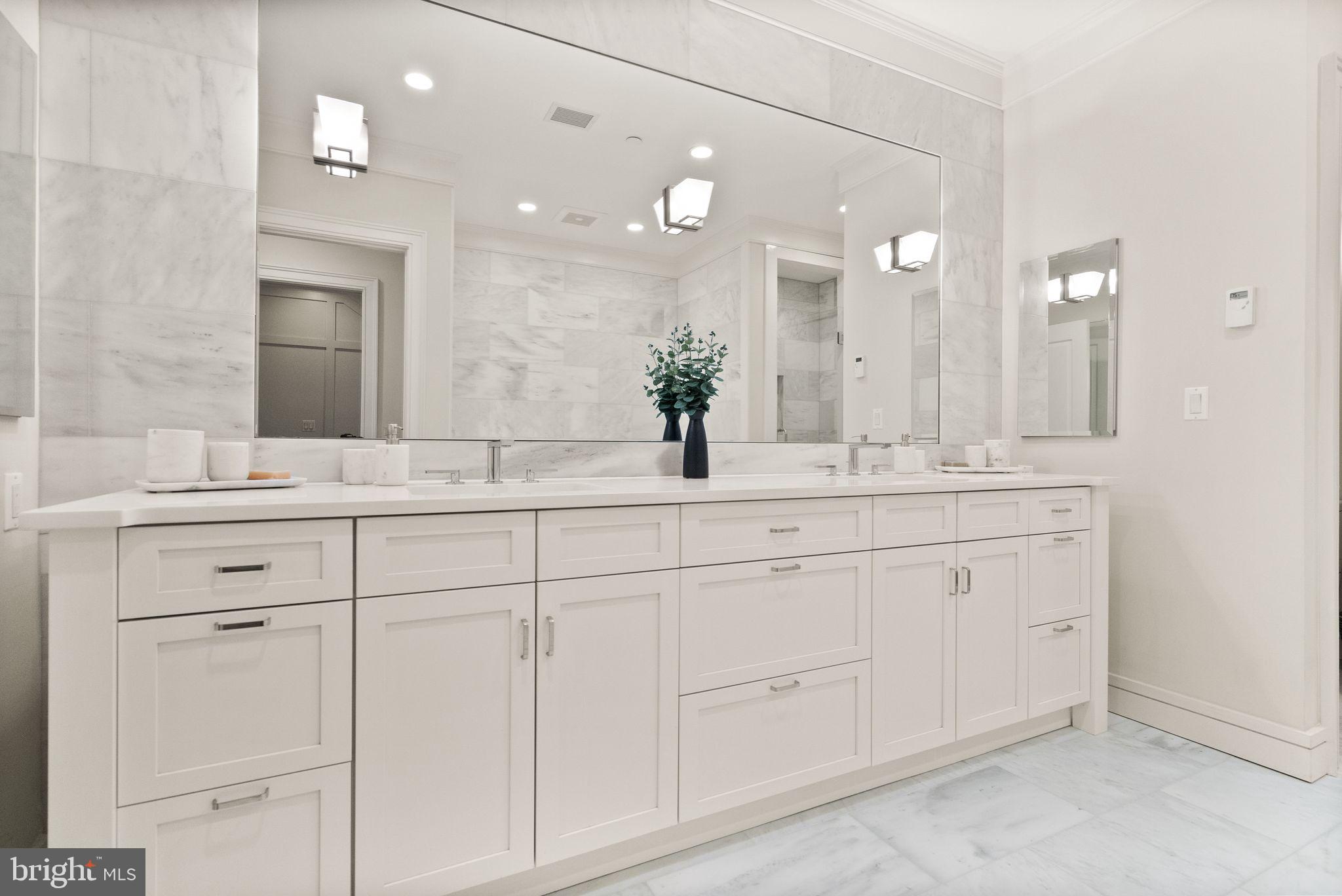 424 3rd Street Northeast Washington, DC 20002 - Photo 19 of 33 a bathroom with a double vanity sink mirror and