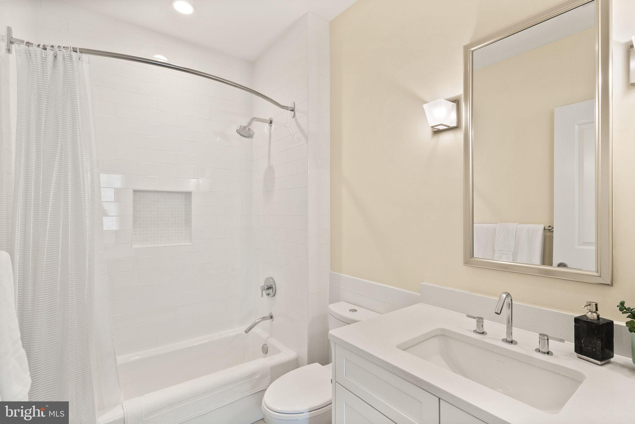 424 3rd Street Northeast Washington, DC 20002 - Photo 28 of 33 a bathroom with a sink toilet and shower