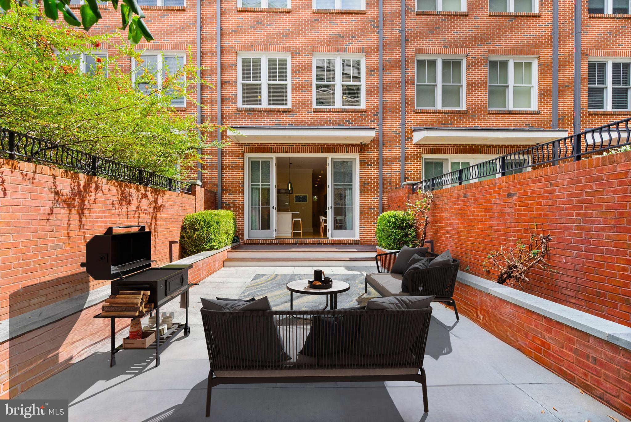 424 3rd Street Northeast Washington, DC 20002 - Photo 30 of 33 a view of a patio with couple of chairs and potted plants