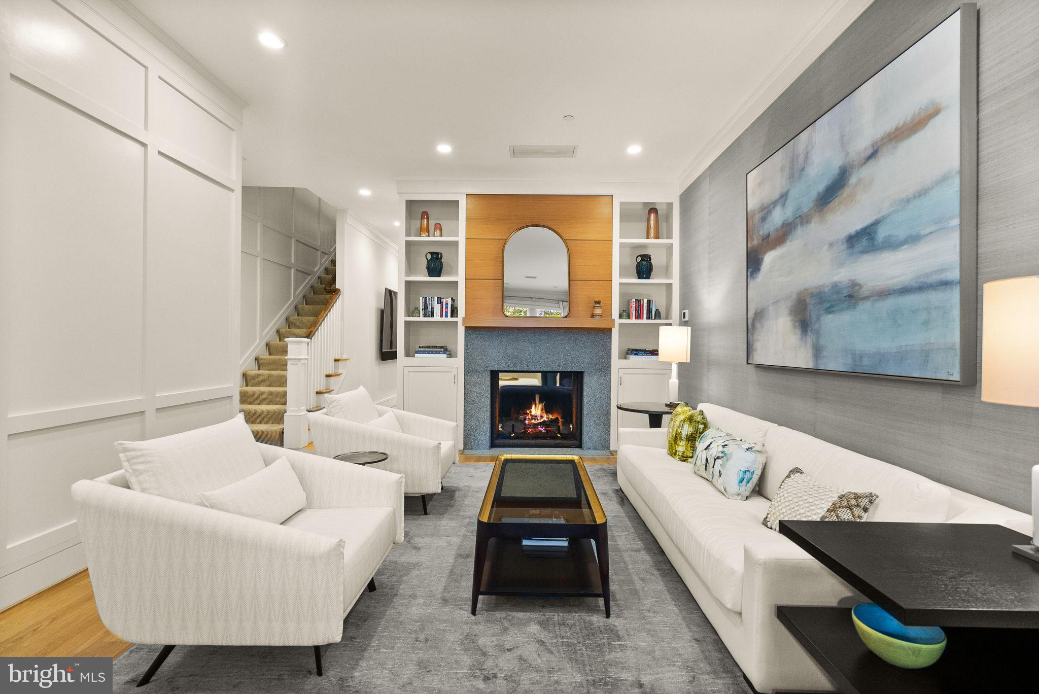 424 3rd Street Northeast Washington, DC 20002 - Photo 3 of 33 a living room with furniture and a fireplace