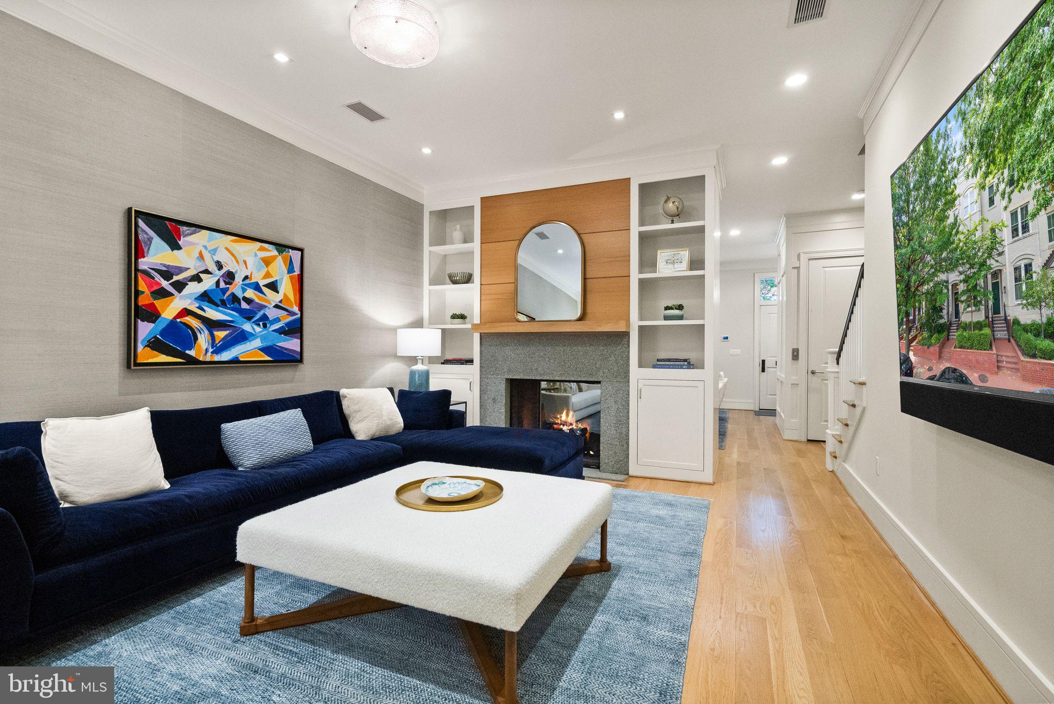 424 3rd Street Northeast Washington, DC 20002 - Photo 6 of 33 a living room with furniture and a fireplace