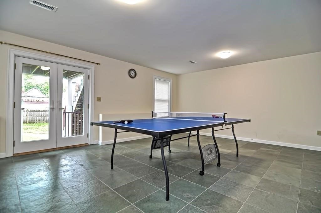 41 Webber Street, Unit 1 Malden, MA 02148 - Photo 14 of 22 a view of a workspace with furniture and a window