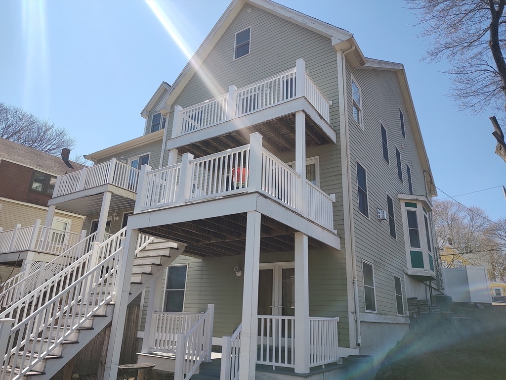 41 Webber Street, Unit 1 Malden, MA 02148 - Photo 18 of 22 a view of a house with a yard