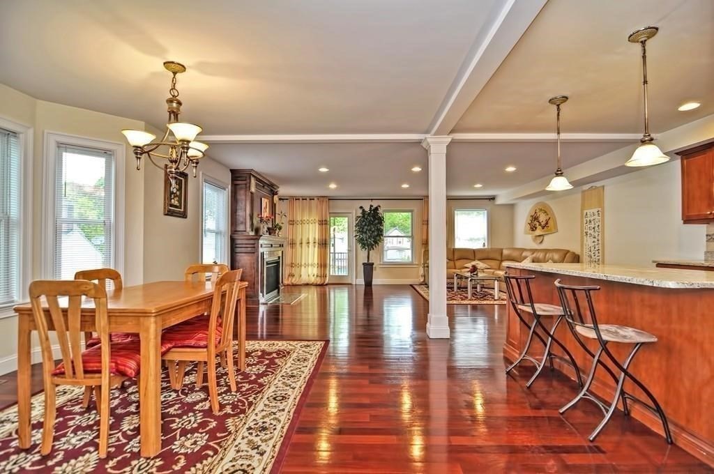 41 Webber Street, Unit 1 Malden, MA 02148 - Photo 2 of 22 a view of a dining room with furniture window and wooden floor