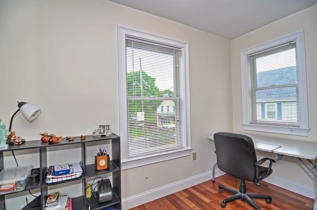 41 Webber Street, Unit 1 Malden, MA 02148 - Photo 10 of 22 a view of a workspace with furniture and a window