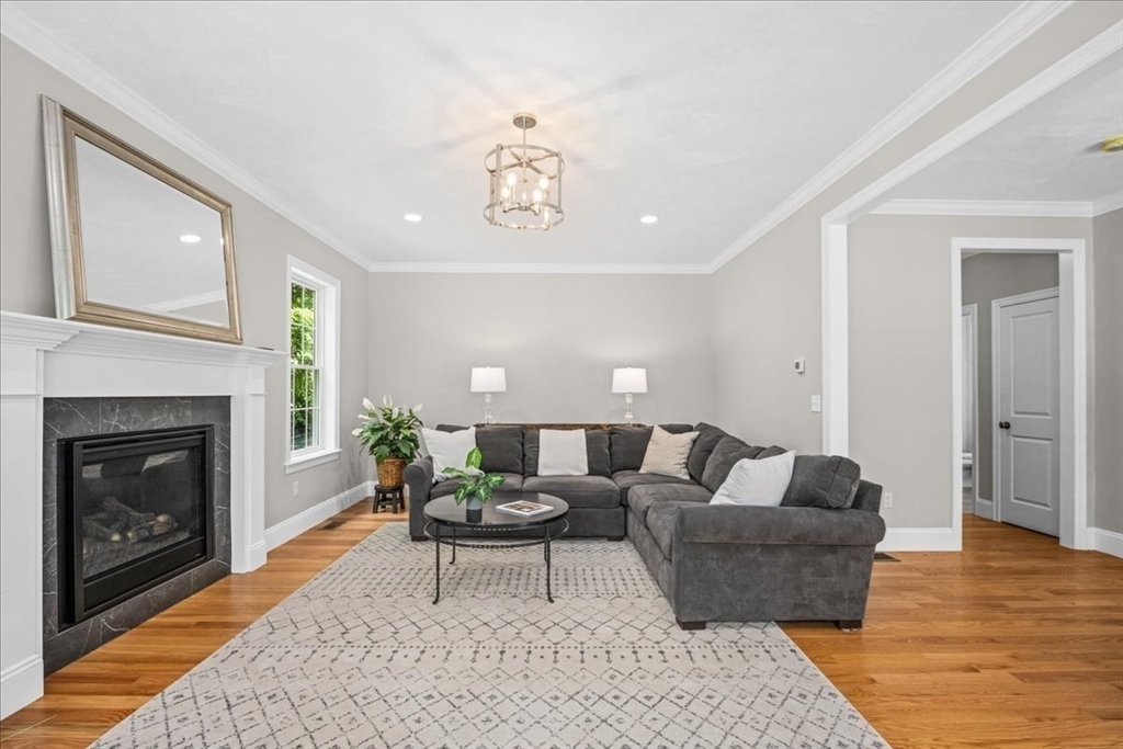 60 Sandersdale Road Charlton, MA 01507 - Photo 14 of 35 a living room with furniture and a fireplace