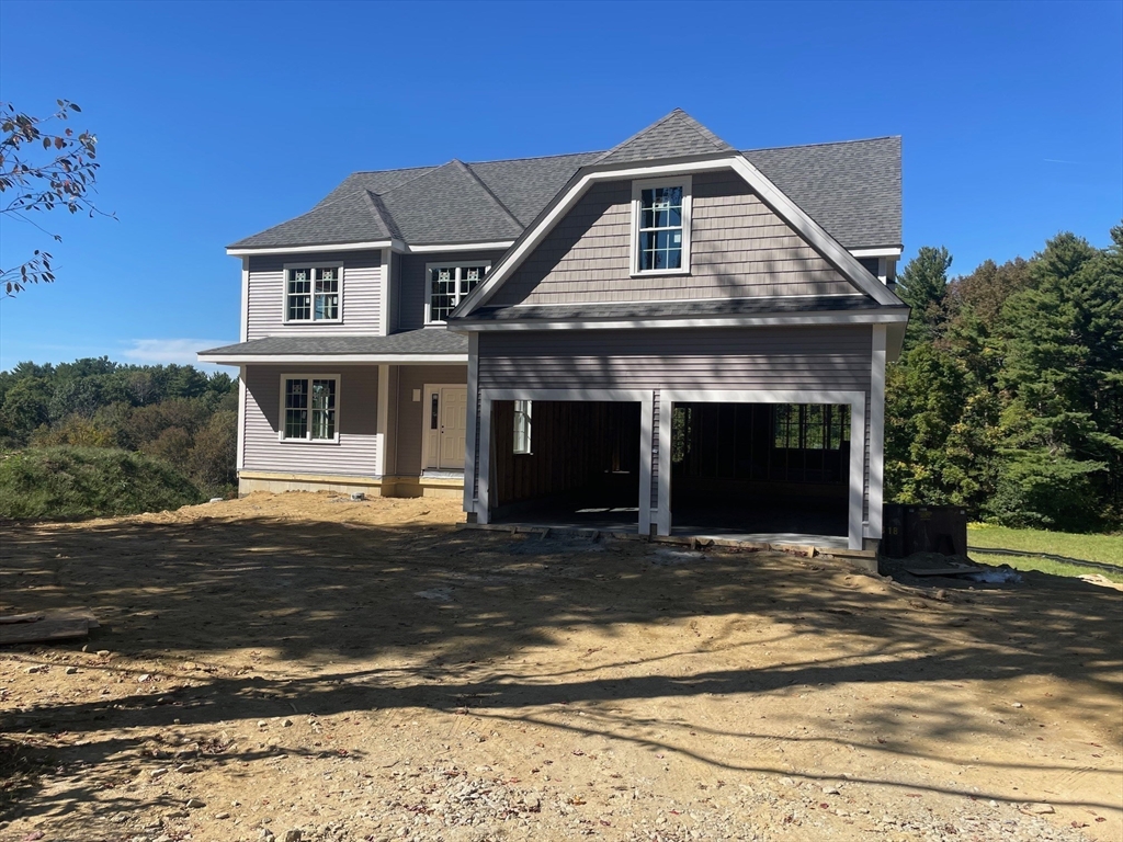 60 Sandersdale Road Charlton, MA 01507 - Photo 2 of 35 a front view of a house with a yard