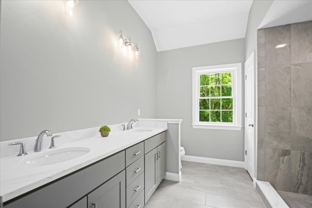 60 Sandersdale Road Charlton, MA 01507 - Photo 24 of 35 a bathroom with a sink double vanity and a