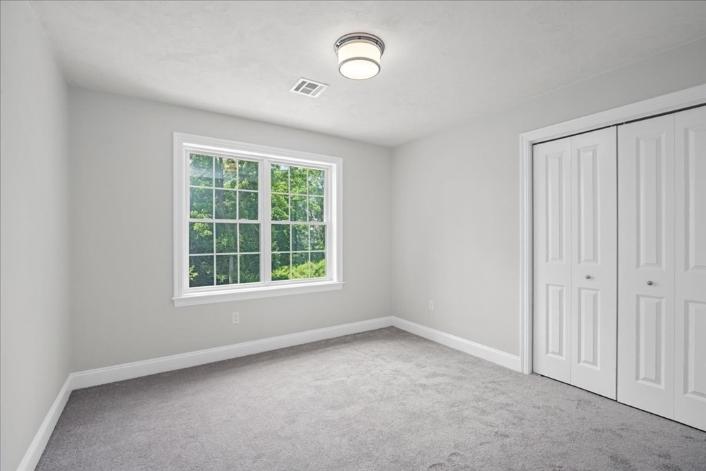 60 Sandersdale Road Charlton, MA 01507 - Photo 26 of 35 an empty room with a window