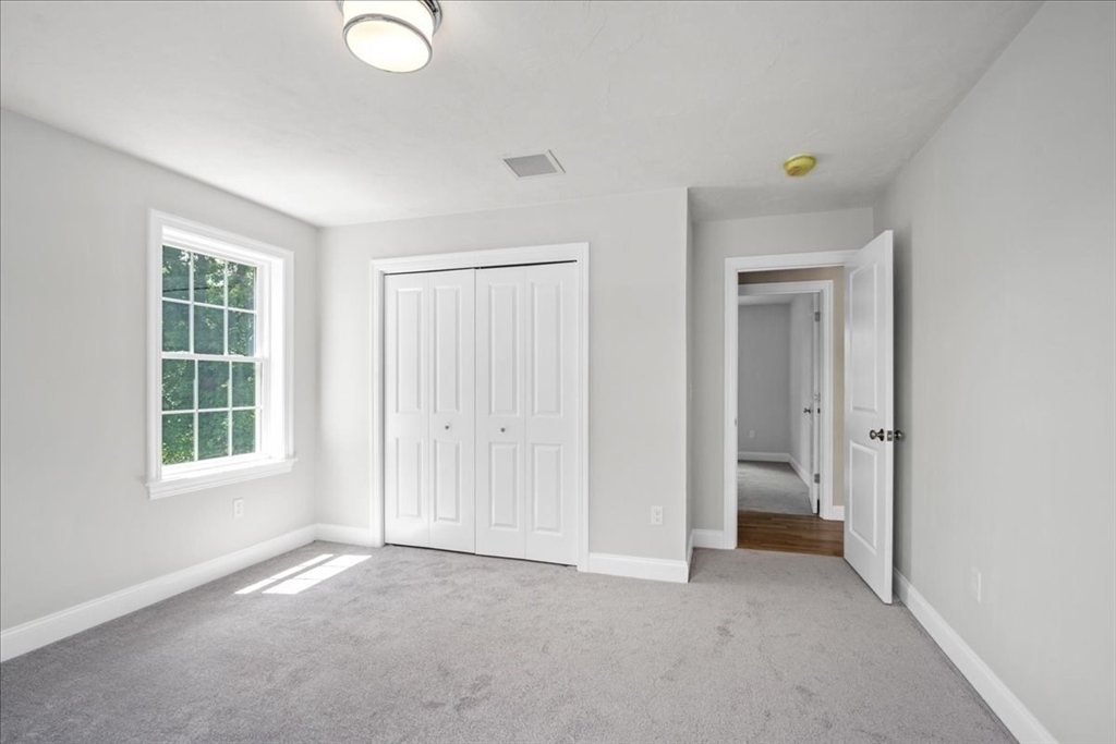 60 Sandersdale Road Charlton, MA 01507 - Photo 29 of 35 an empty room with windows and closet